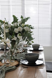 Festive table setting with beautiful tableware and decor indoors