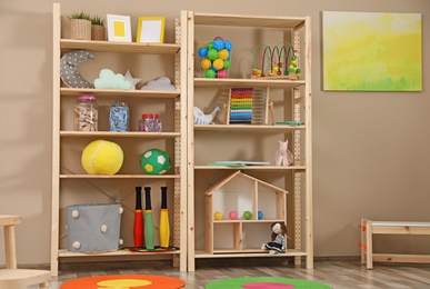 Storage for toys in colorful child's room. Idea for interior design