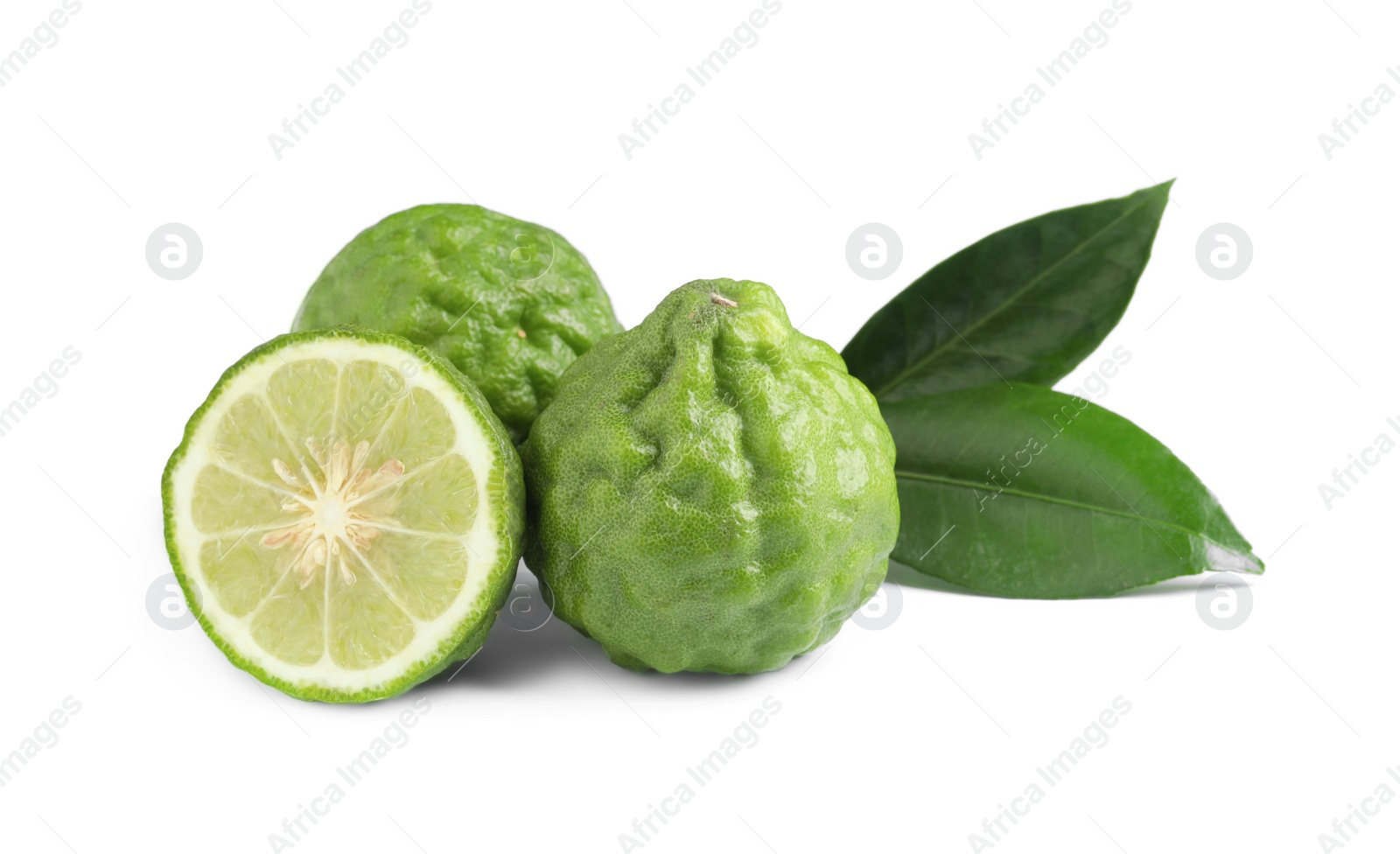 Photo of Fresh ripe bergamot fruits and leaves on white background
