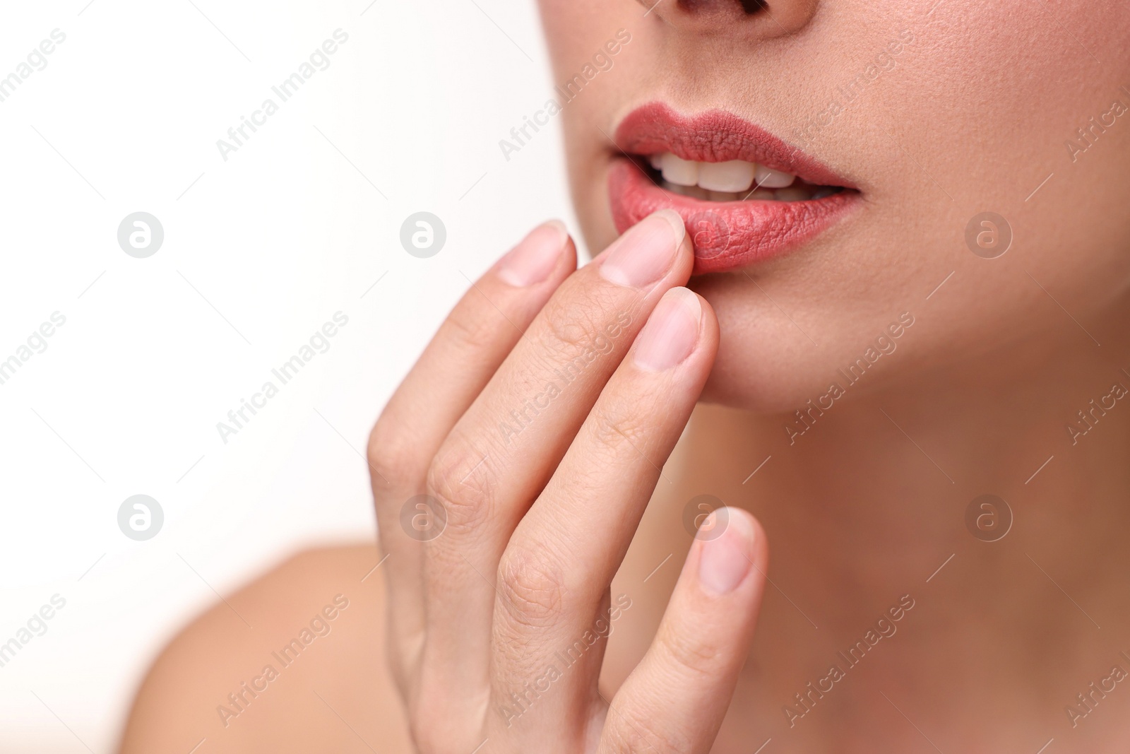 Photo of Woman with beautiful lips on white background, closeup. Space for text