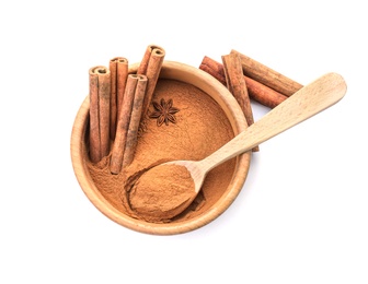 Photo of Bowl with aromatic cinnamon sticks and powder on white background