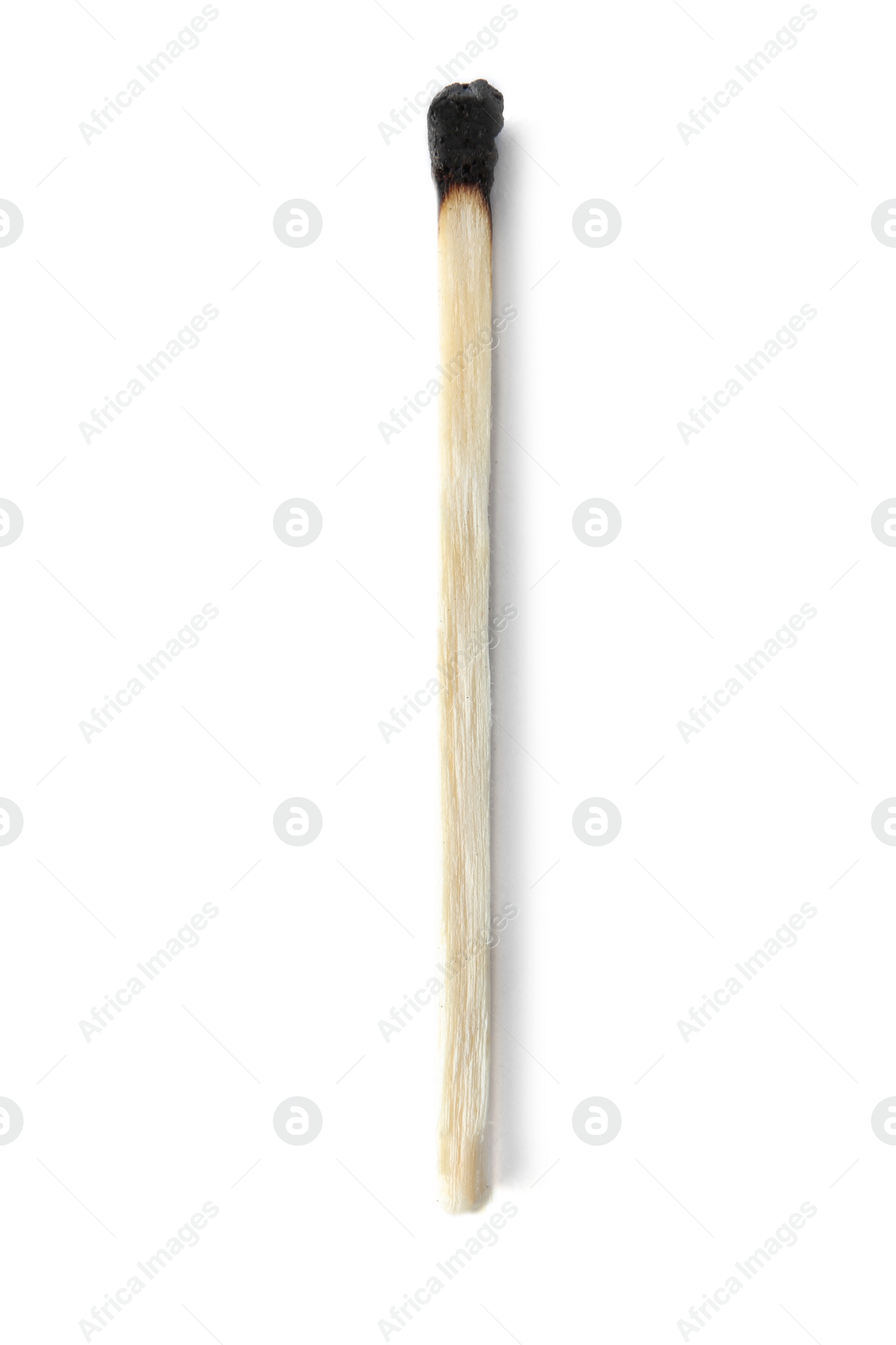 Photo of Burnt match on white background, top view