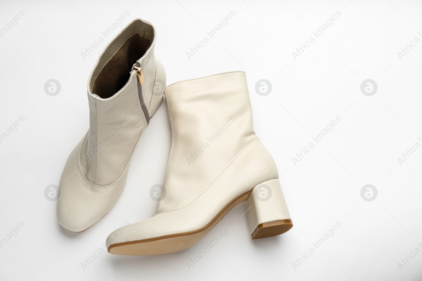 Photo of Pair of stylish leather shoes on white background, above view