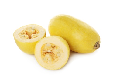 Photo of Whole and cut spaghetti squashes on white background