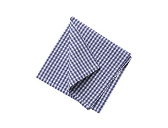 Blue checkered tablecloth on white background, top view