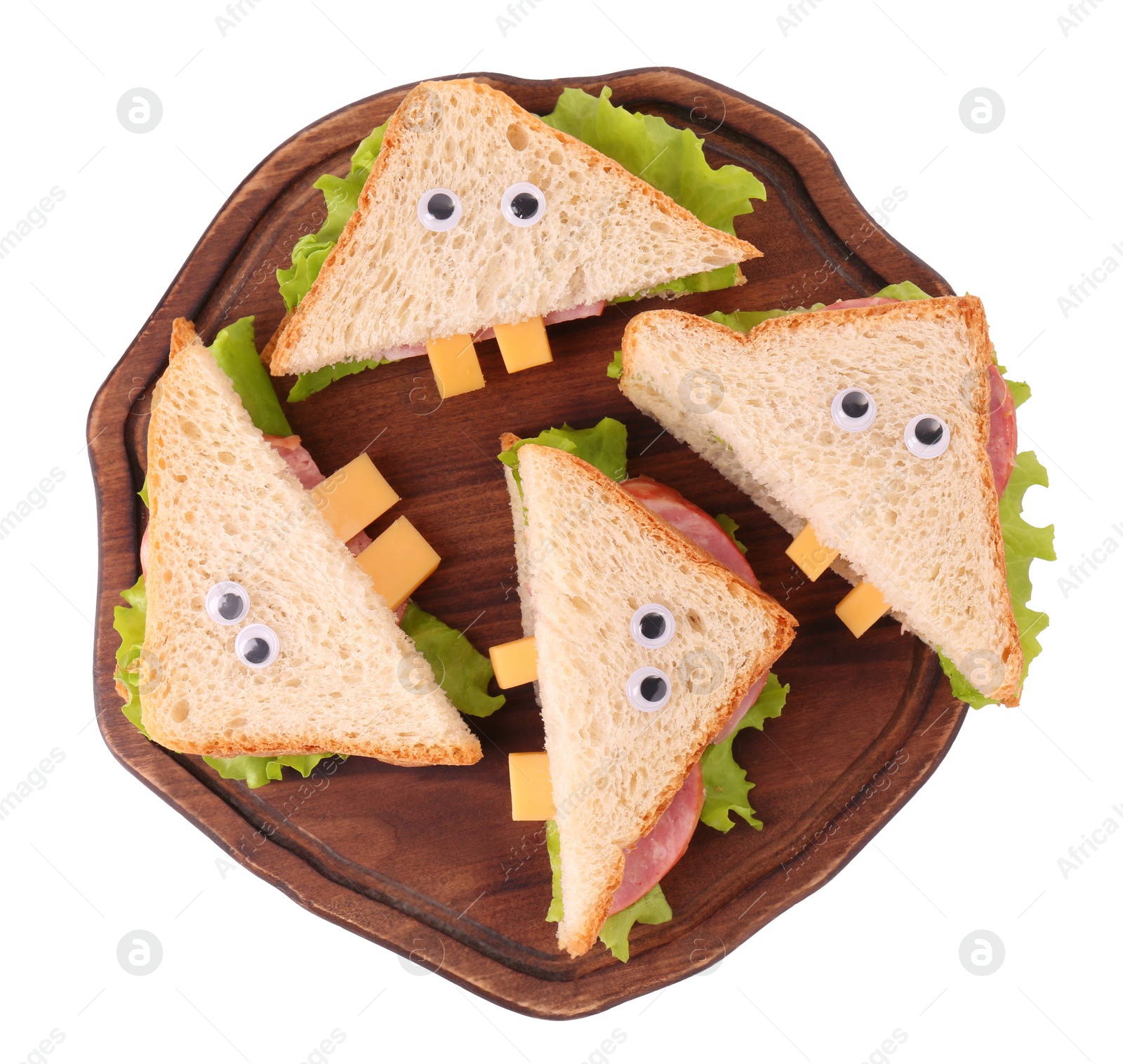 Photo of Board with tasty monster sandwiches isolated on white, top view. Halloween food