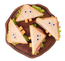 Board with tasty monster sandwiches isolated on white, top view. Halloween food