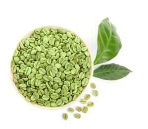 Photo of Bowl with green coffee beans and fresh leaves on white background, top view