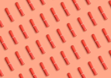 Image of Many tampons on coral background, flat lay 
