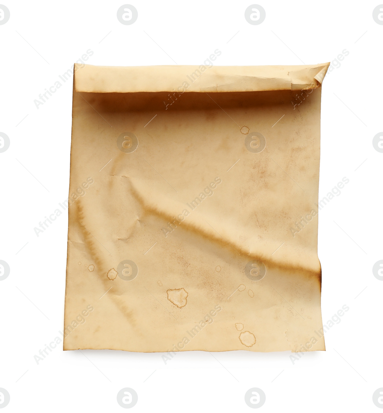 Photo of Sheet of old parchment paper isolated on white, top view. Space for design