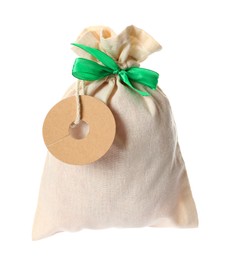 Photo of Small bag with green ribbon isolated on white. Christmas advent calendar
