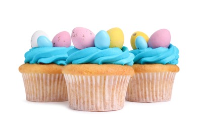 Photo of Tasty decorated Easter cupcakes isolated on white