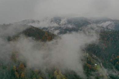 Aerial view of mountains covered with fog