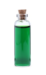 Glass bottle of green food coloring on white background