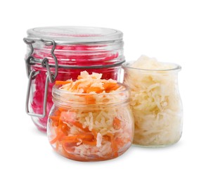 Photo of Delicious sauerkraut prepared according to different recipes on white background