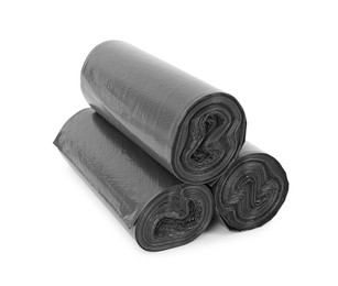 Photo of Rolls of black garbage bags isolated on white