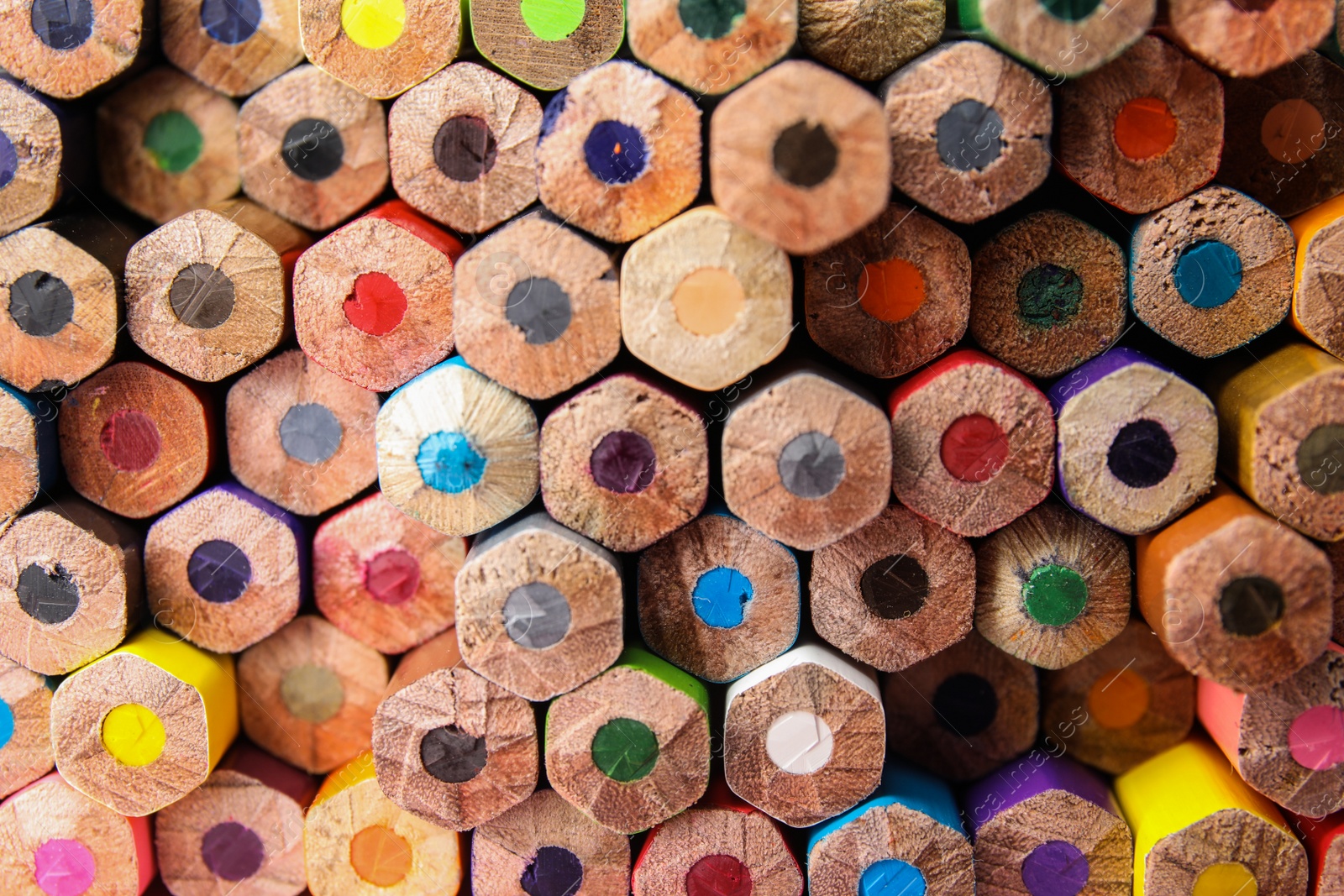 Photo of Different color pencils as background, top view