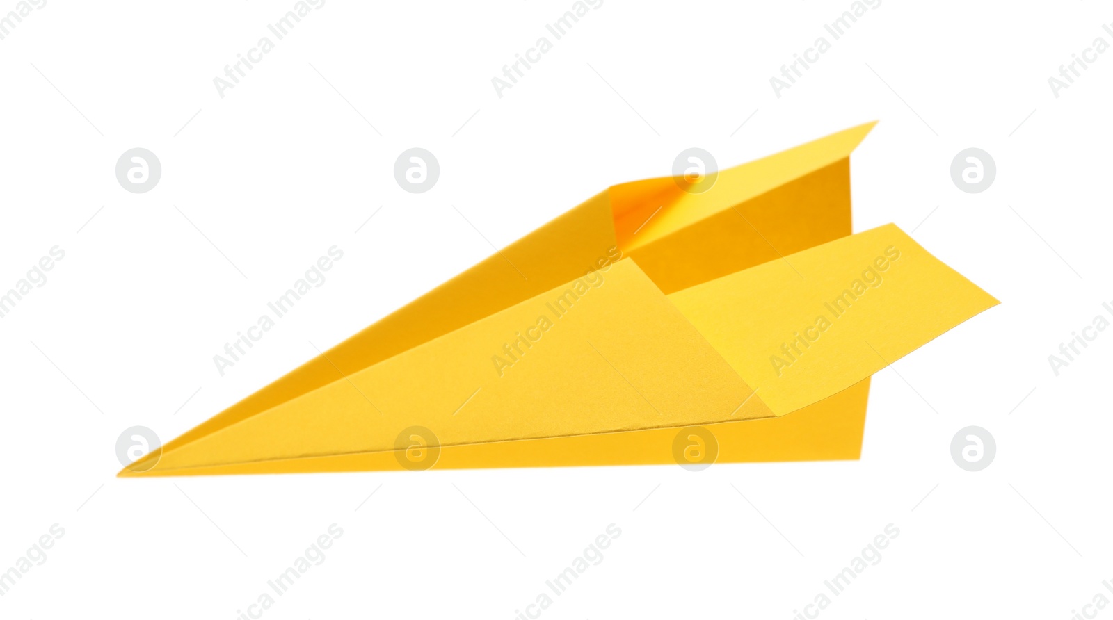 Photo of Handmade yellow paper plane isolated on white