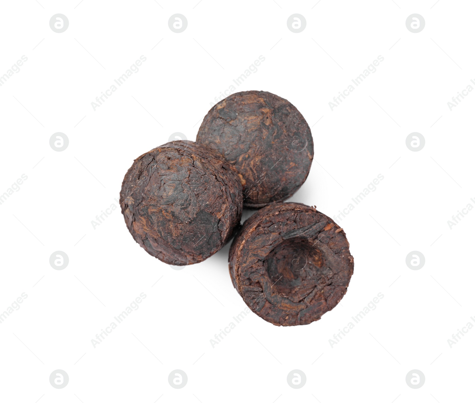 Photo of Cake shaped traditional Chinese pu-erh tea isolated on white, top view