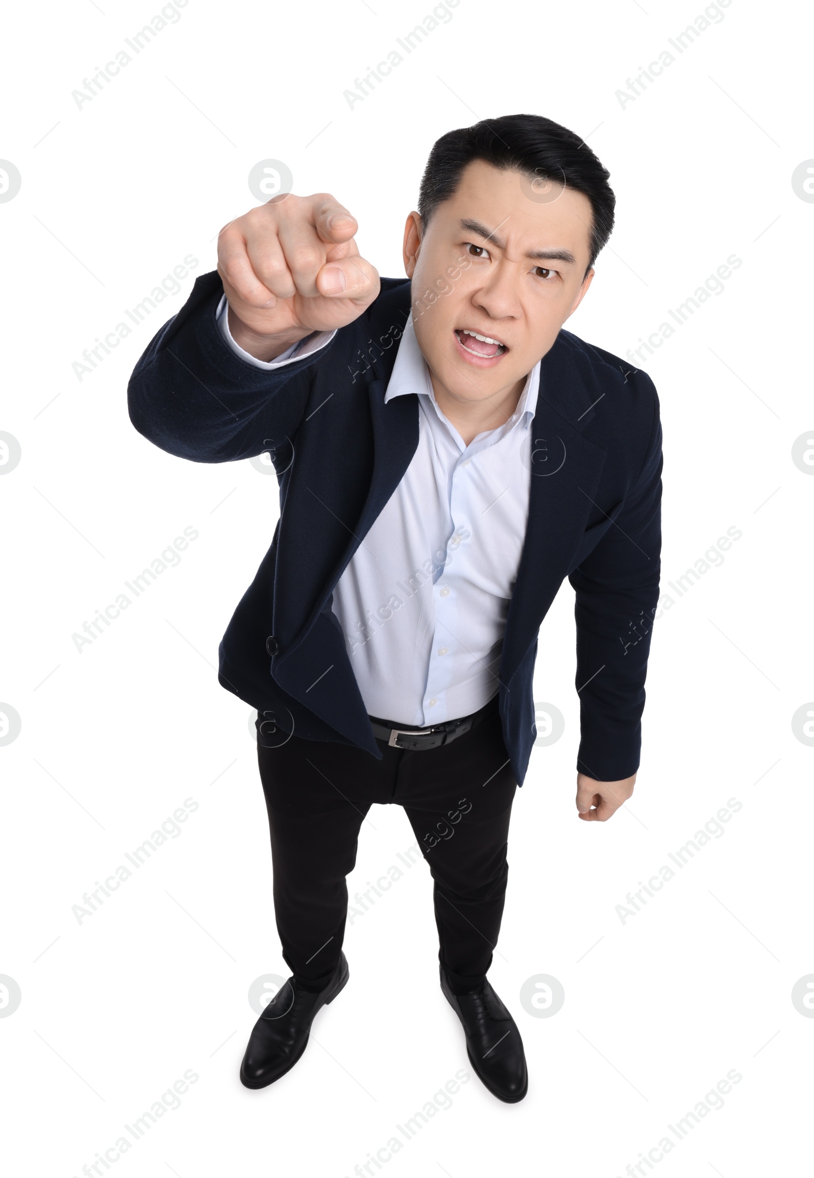 Photo of Angry businessman in suit posing on white background, above view