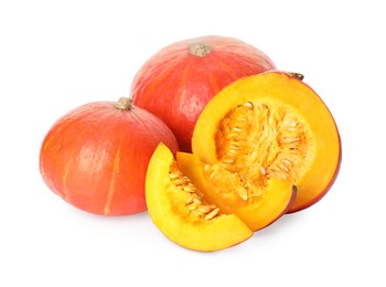 Photo of Many whole and cut ripe pumpkins on white background