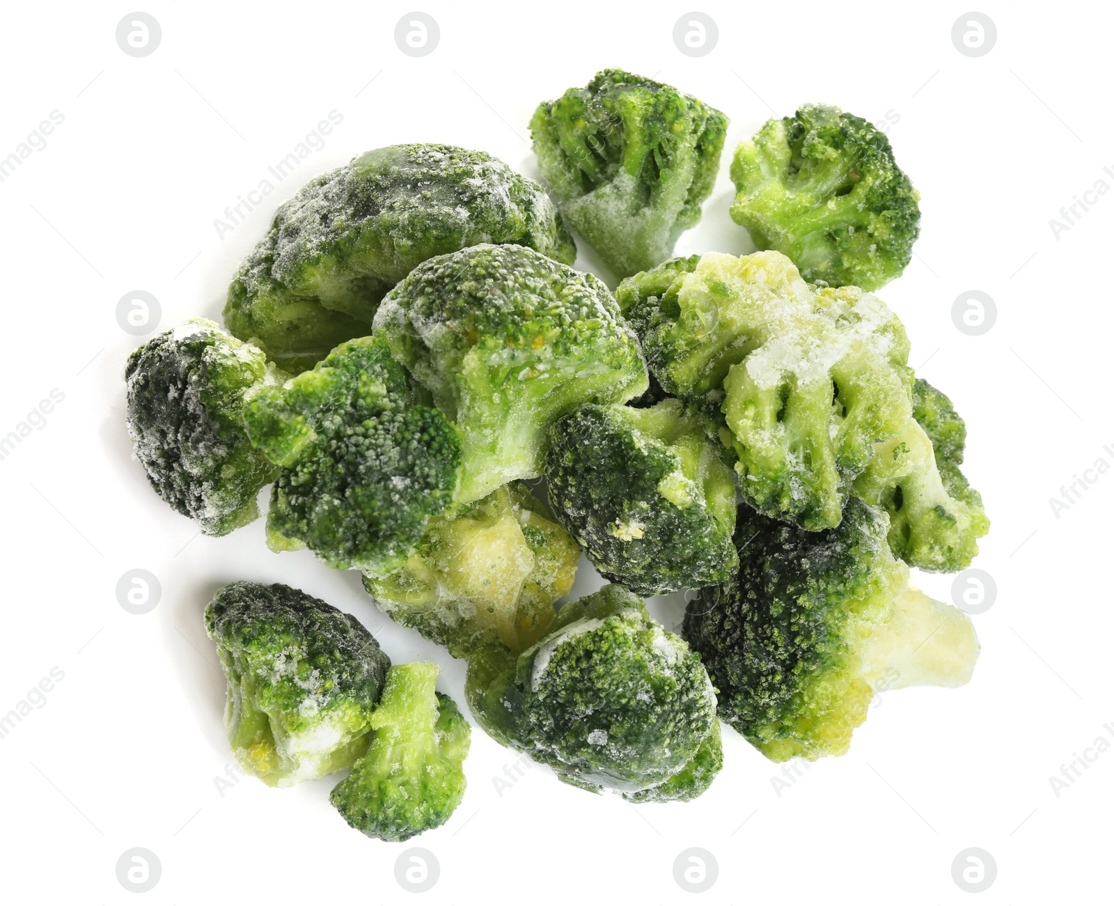 Photo of Pile of frozen broccoli florets isolated on white, top view. Vegetable preservation