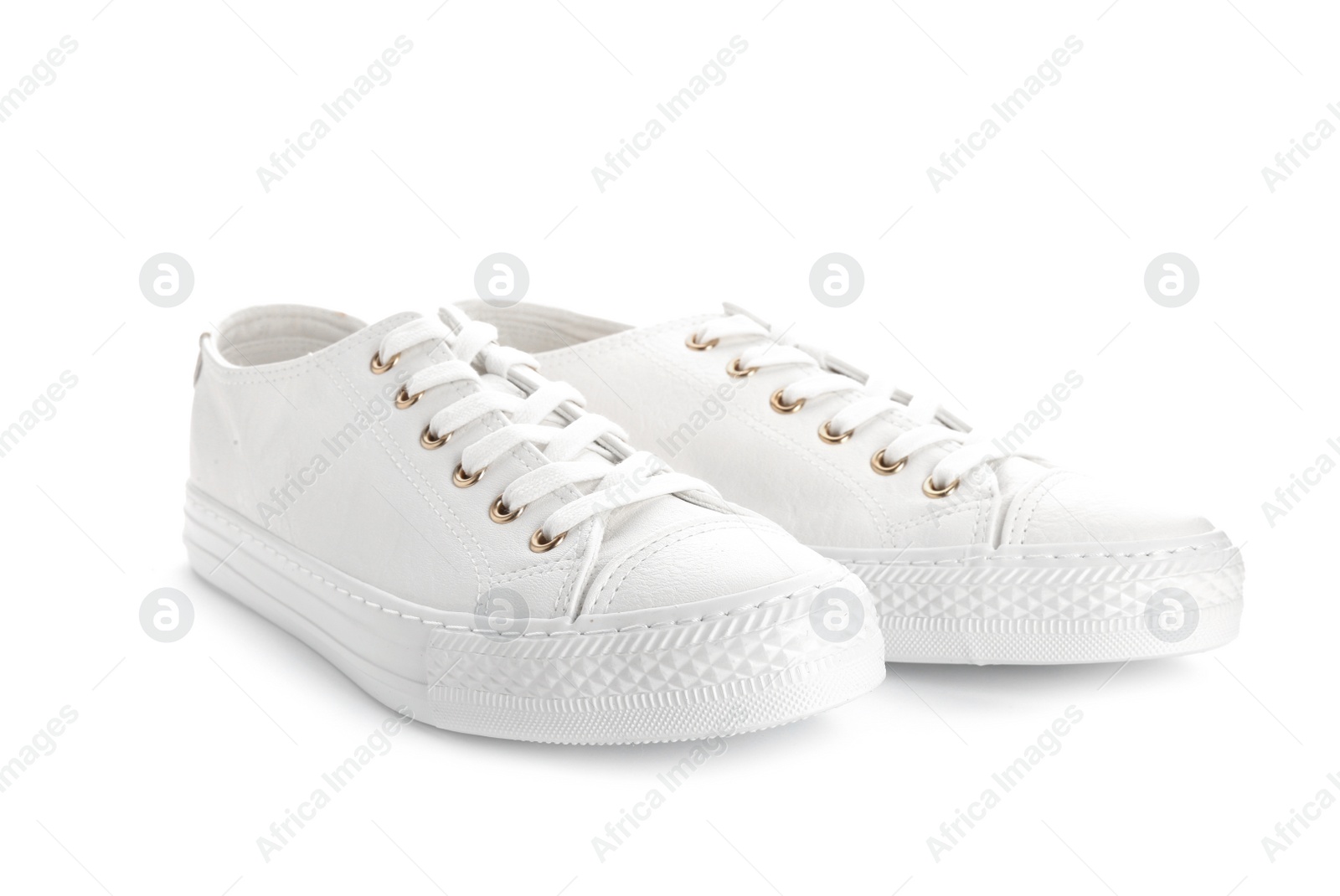 Photo of Pair of stylish sneakers on white background