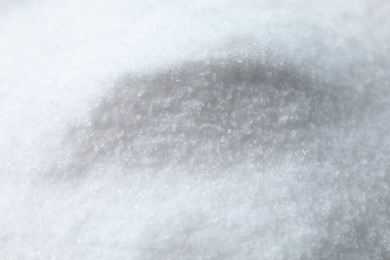 Organic white sea salt as background, closeup