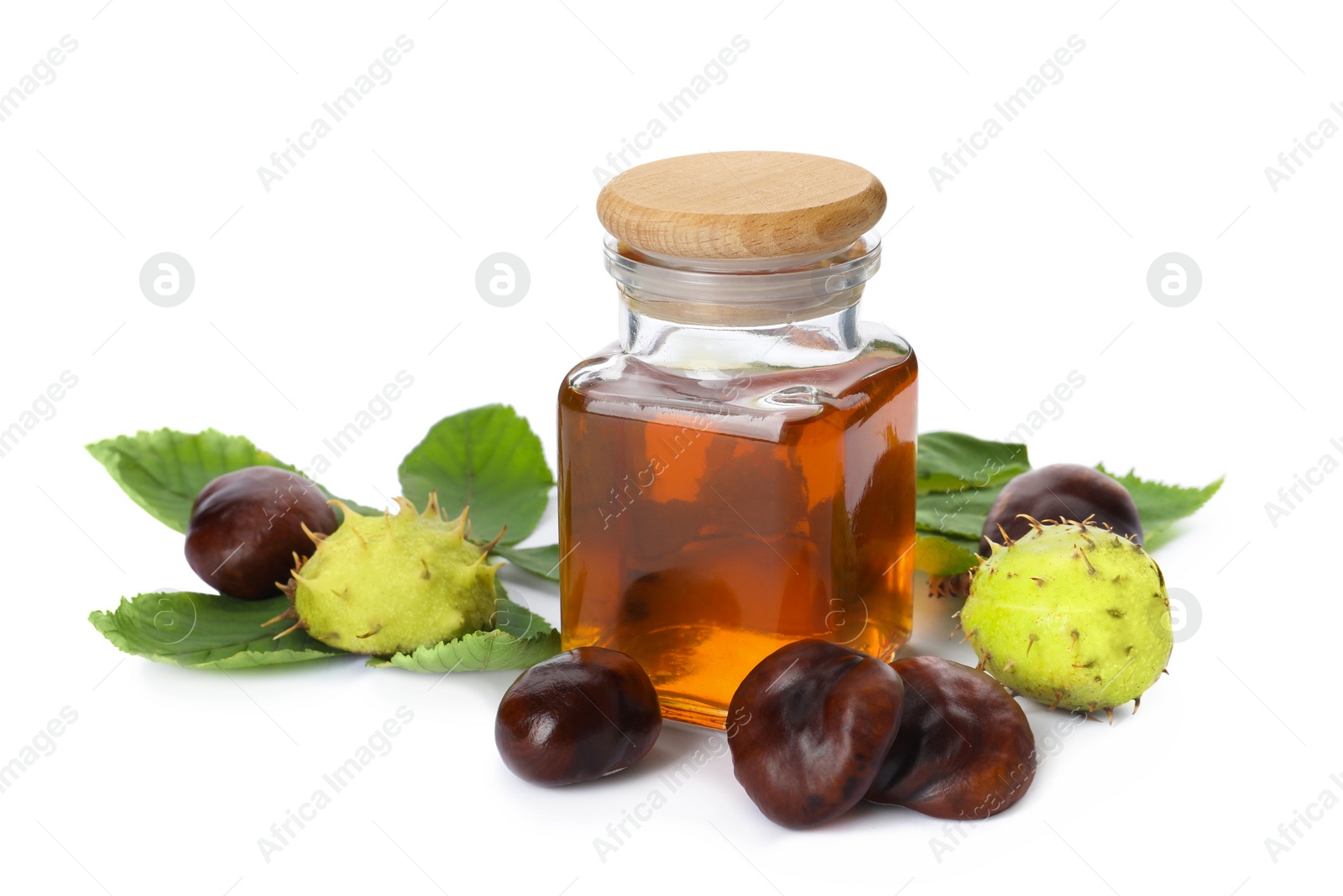 Photo of Horse chestnuts, bottle of tincture and green leaves on white background