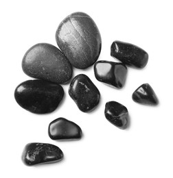 Photo of Group of different stones on white background, top view