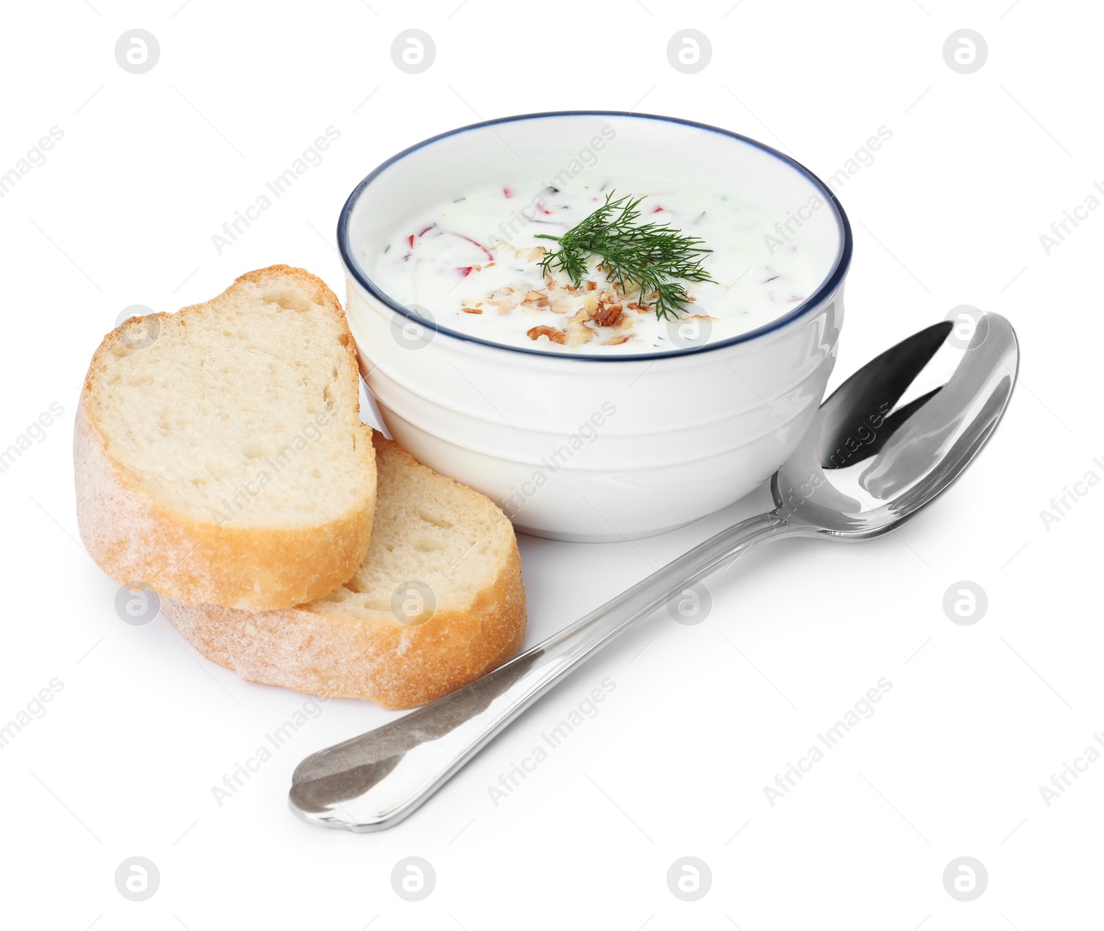 Photo of Delicious cold summer soup and bread on white background