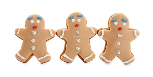 Photo of Gingerbread men isolated on white. Delicious Christmas cookie