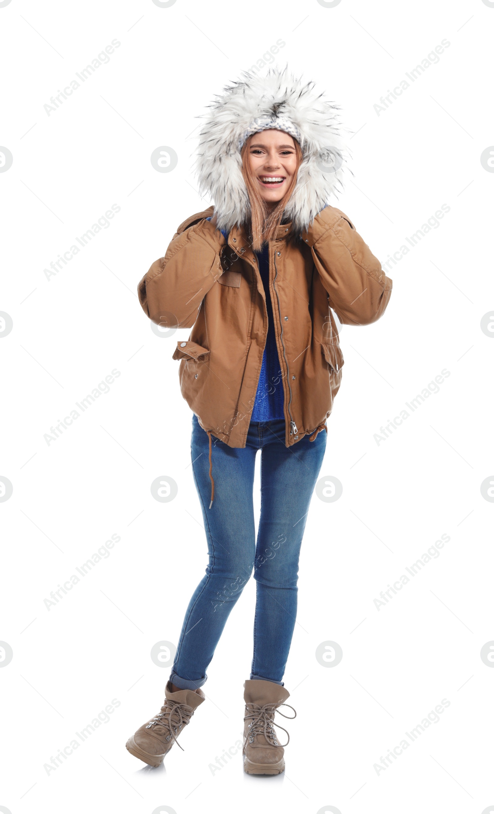 Photo of Young woman wearing warm clothes on white background. Ready for winter vacation