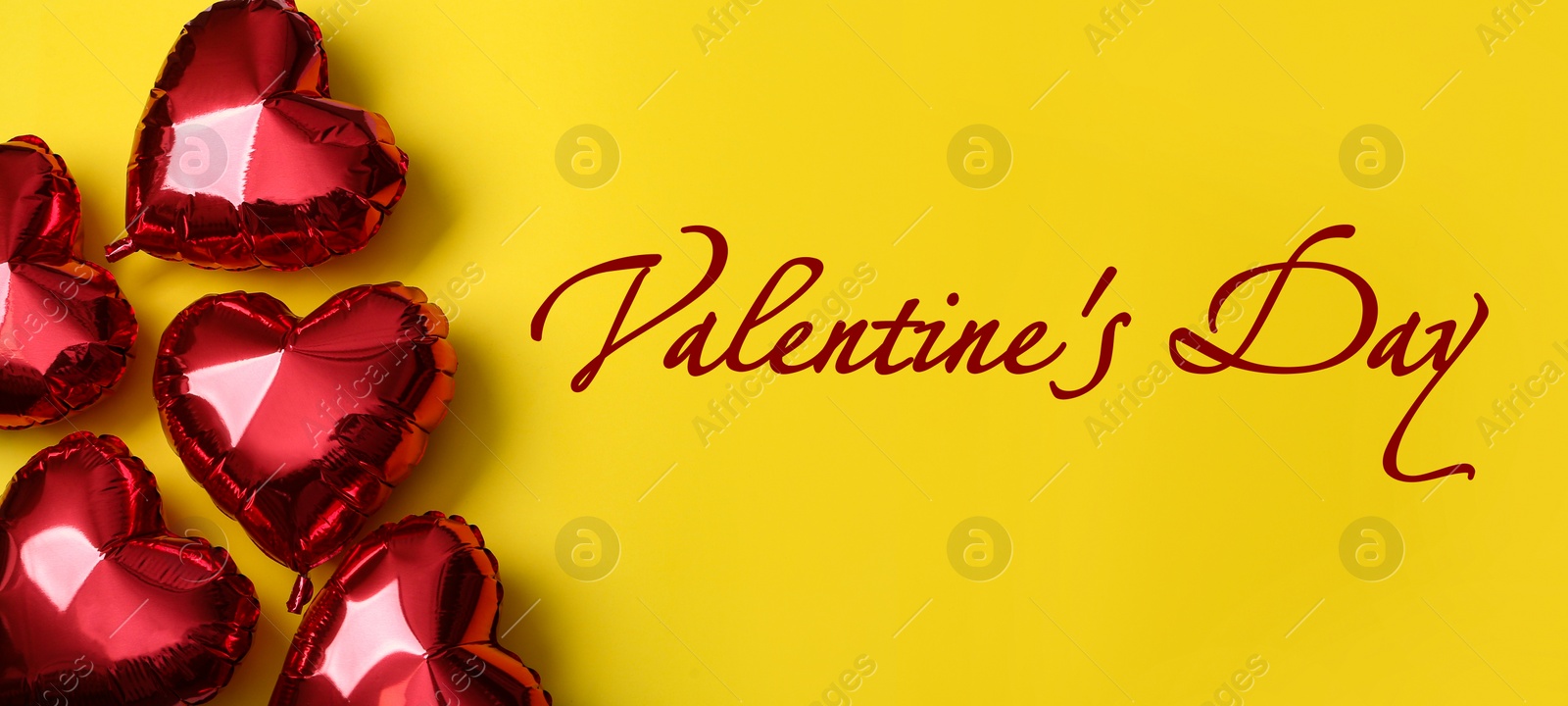 Image of Happy Valentine's Day. Red heart shaped balloons on yellow background, flat lay 