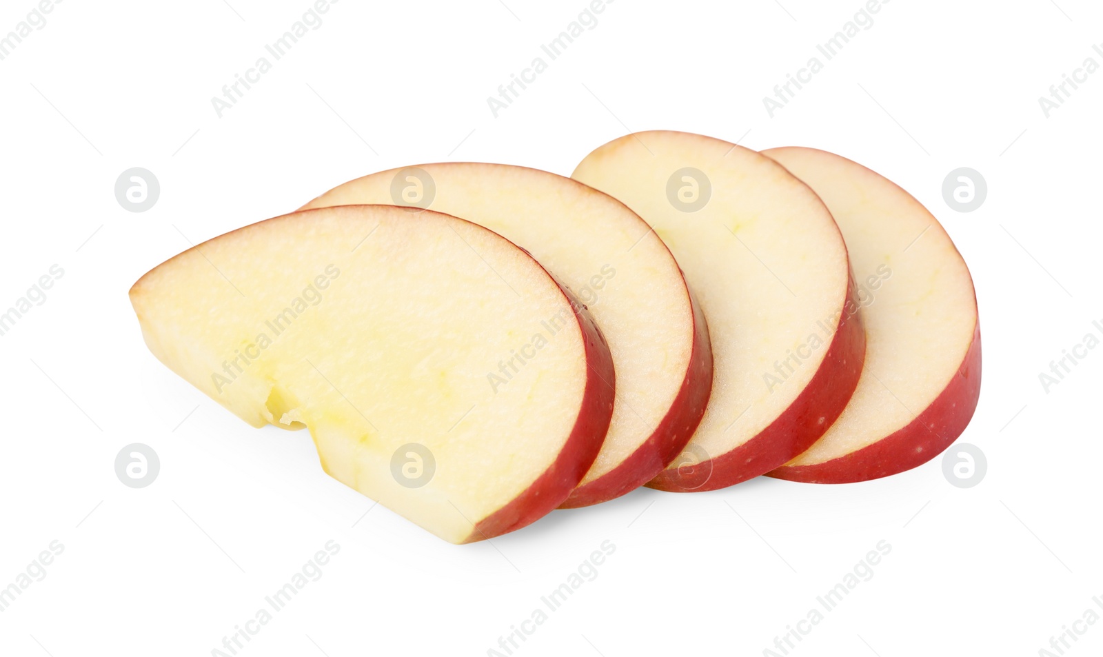 Photo of Slices of ripe red apple isolated on white