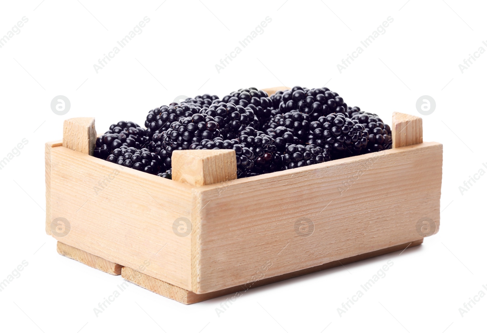Photo of Wooden crate with fresh blackberries on white background