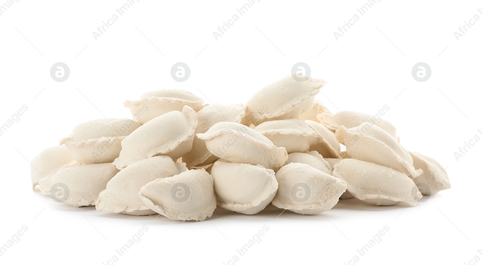 Photo of Heap of raw dumplings on white background