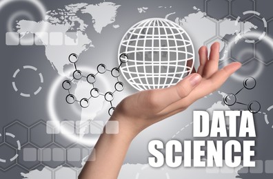 Image of Data science. Woman holding digital globe, closeup