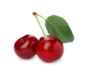 Photo of Sweet red juicy cherries with leaf isolated on white