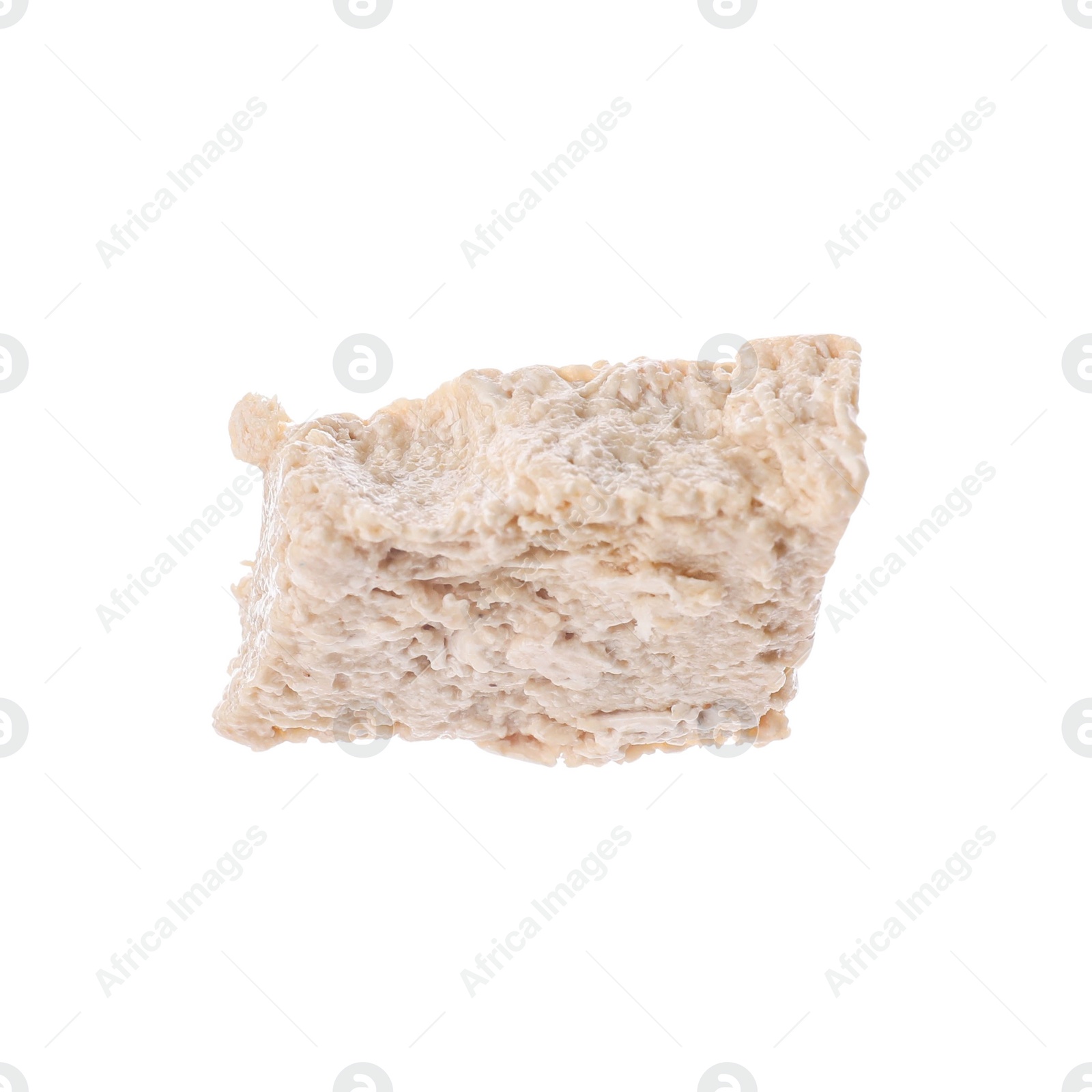 Photo of Piece of tasty halva isolated on white