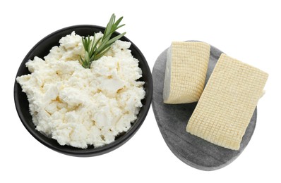 Photo of Different types of delicious tofu cheese with rosemary on white background, top view