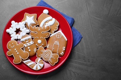 Tasty Christmas cookies on grey table, flat lay. Space for text