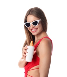 Photo of Woman with bottle of sun protection body cream on white background
