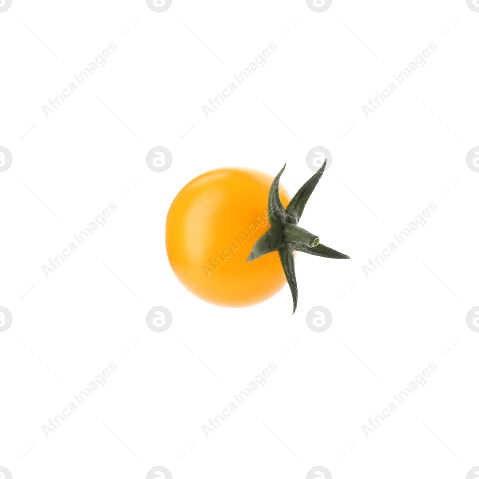 Photo of Ripe yellow cherry tomato isolated on white