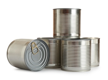 Photo of Many closed tin cans isolated on white, mockup for design