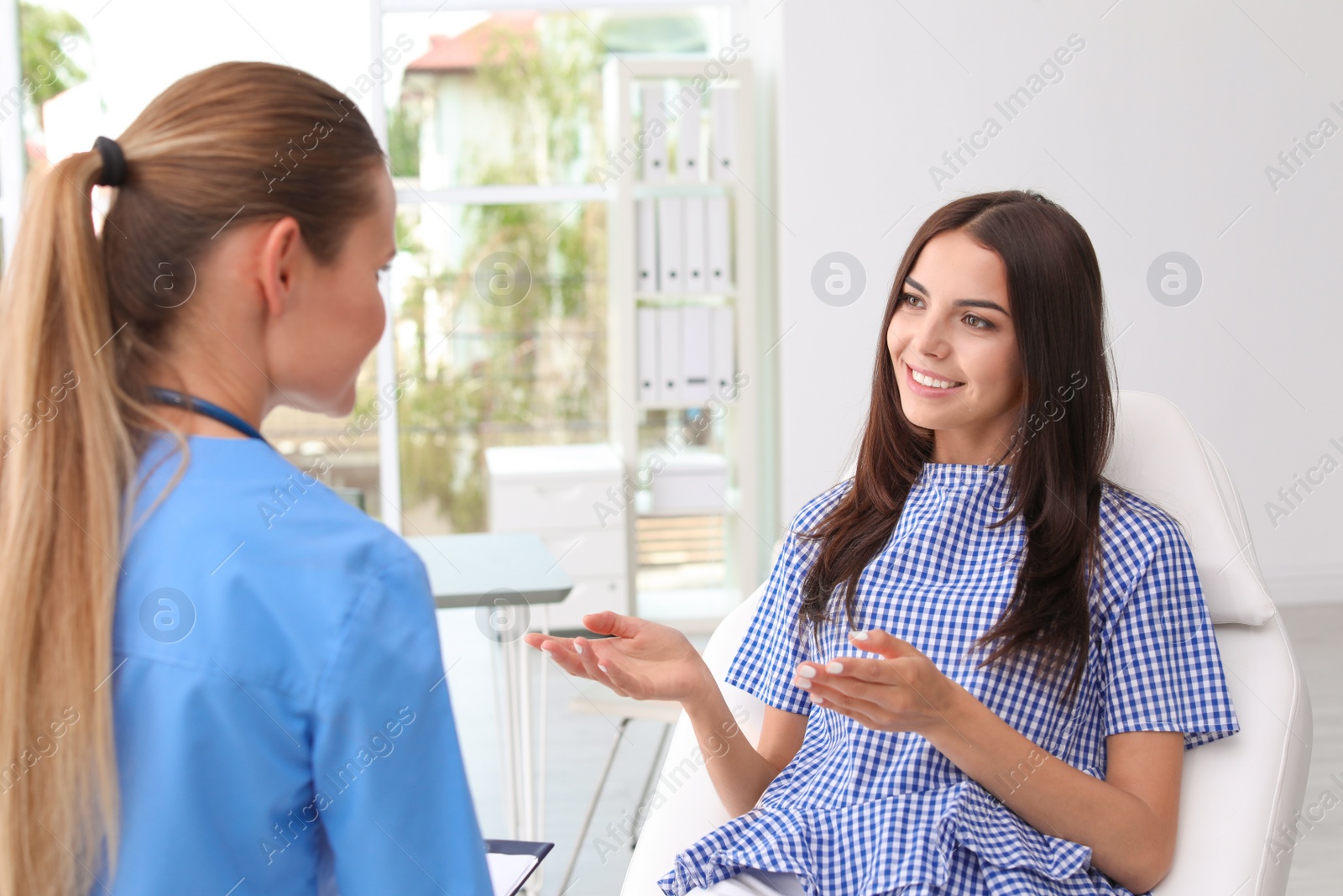 Photo of Patient having appointment with doctor in hospital