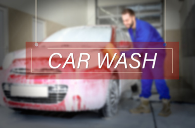 Text Car Wash and worker cleaning automobile with sponge on background