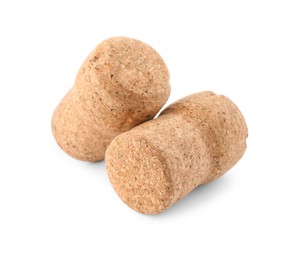 Two sparkling wine corks on white background