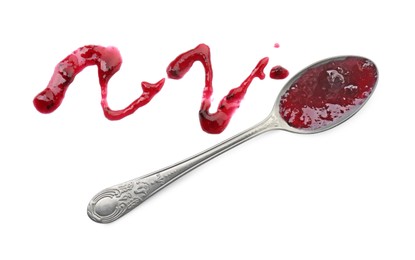 Tasty sweet jam and spoon isolated on white, top view