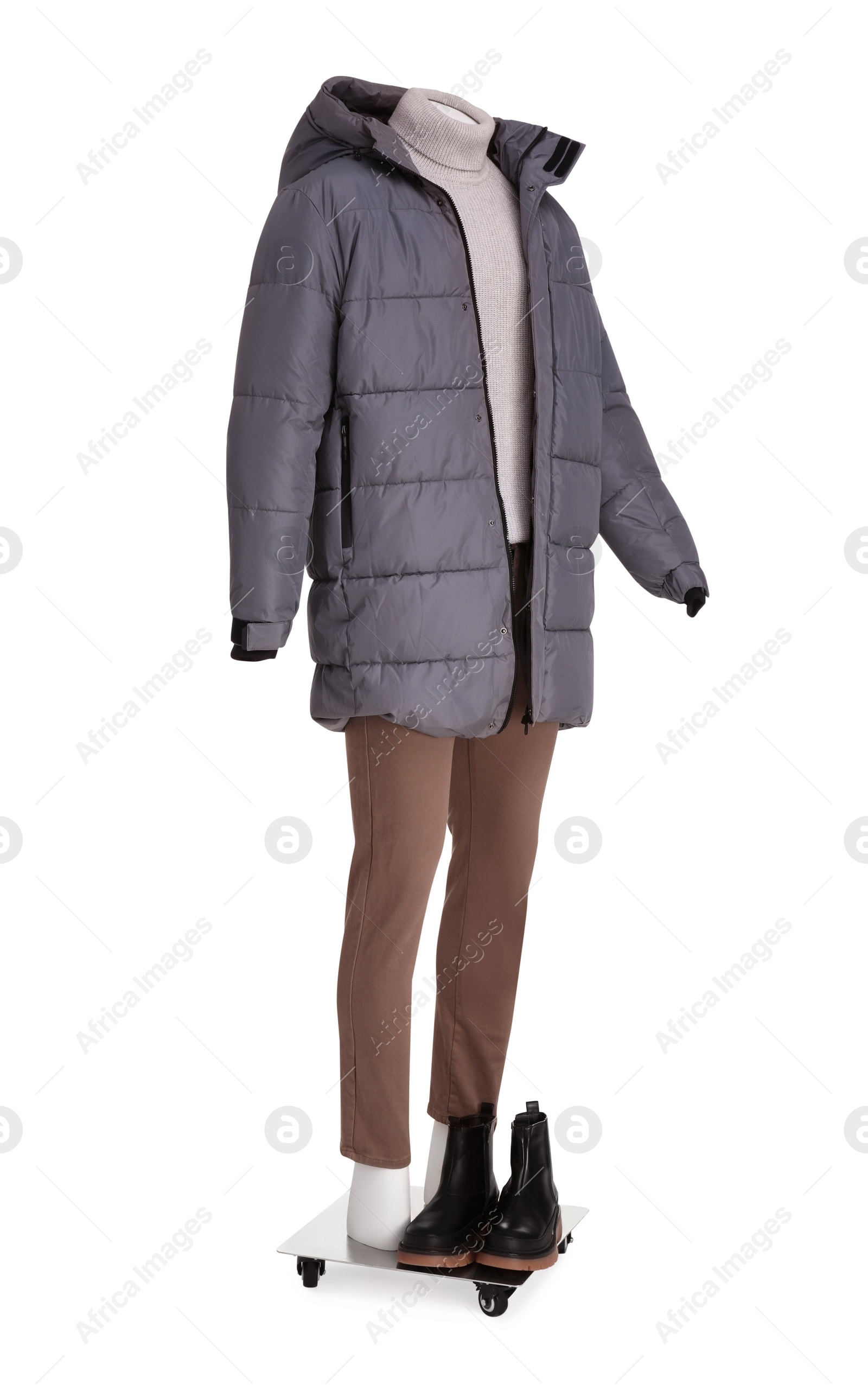 Photo of Male mannequin with shoes dressed in stylish grey jacket, turtleneck and pants isolated on white